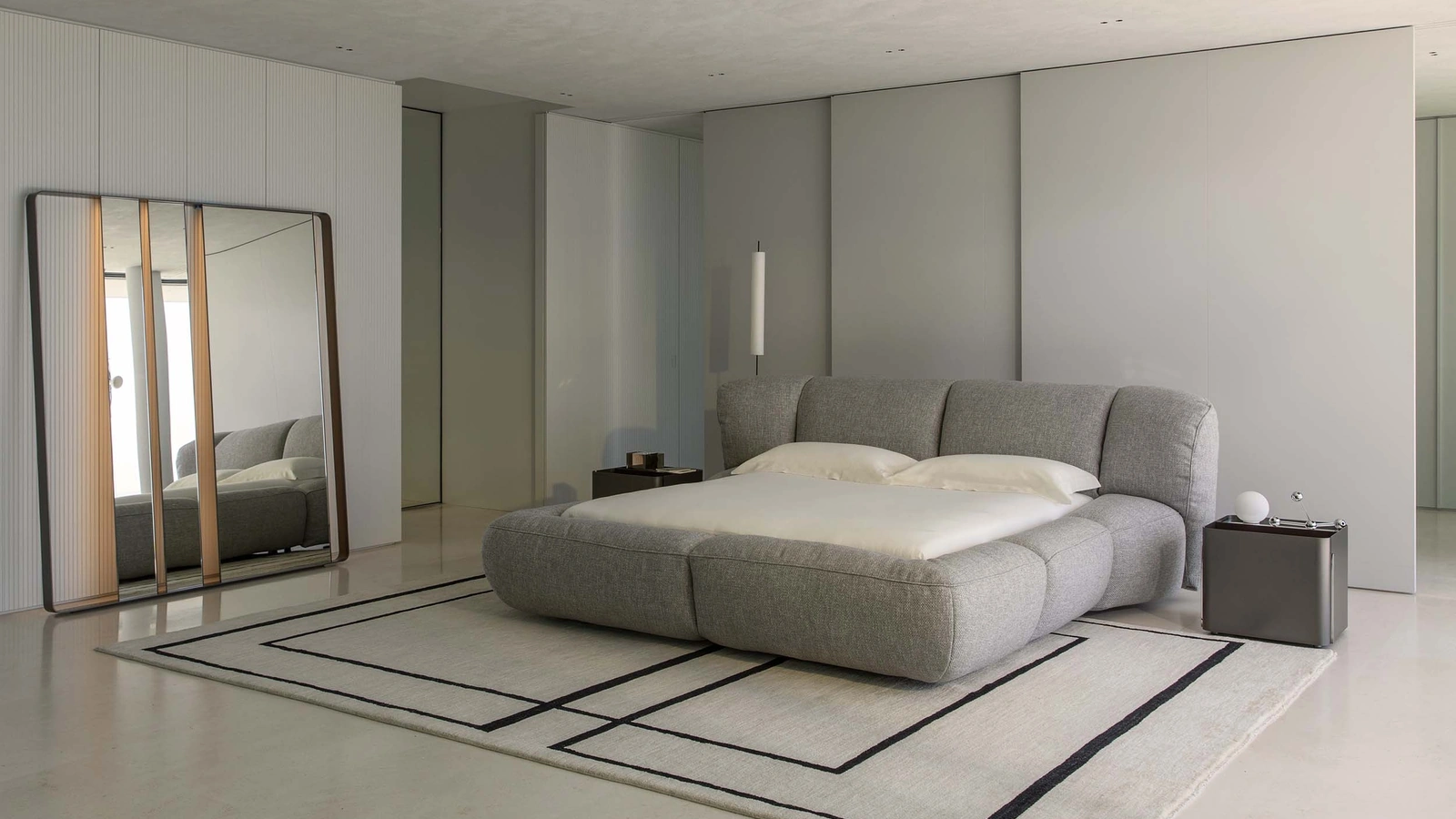 Orma upholstered bed by Flou