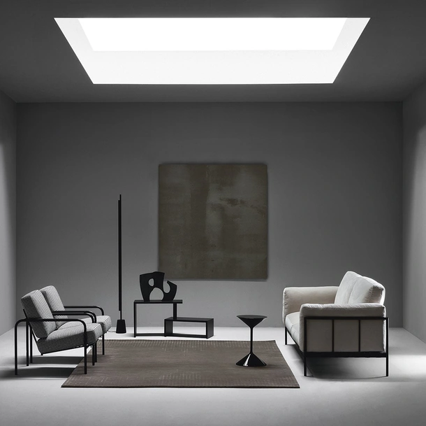 Linear fabric sofa with metal frame by Zanotta