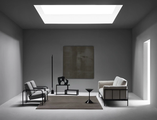 Linear fabric sofa with metal frame by Zanotta