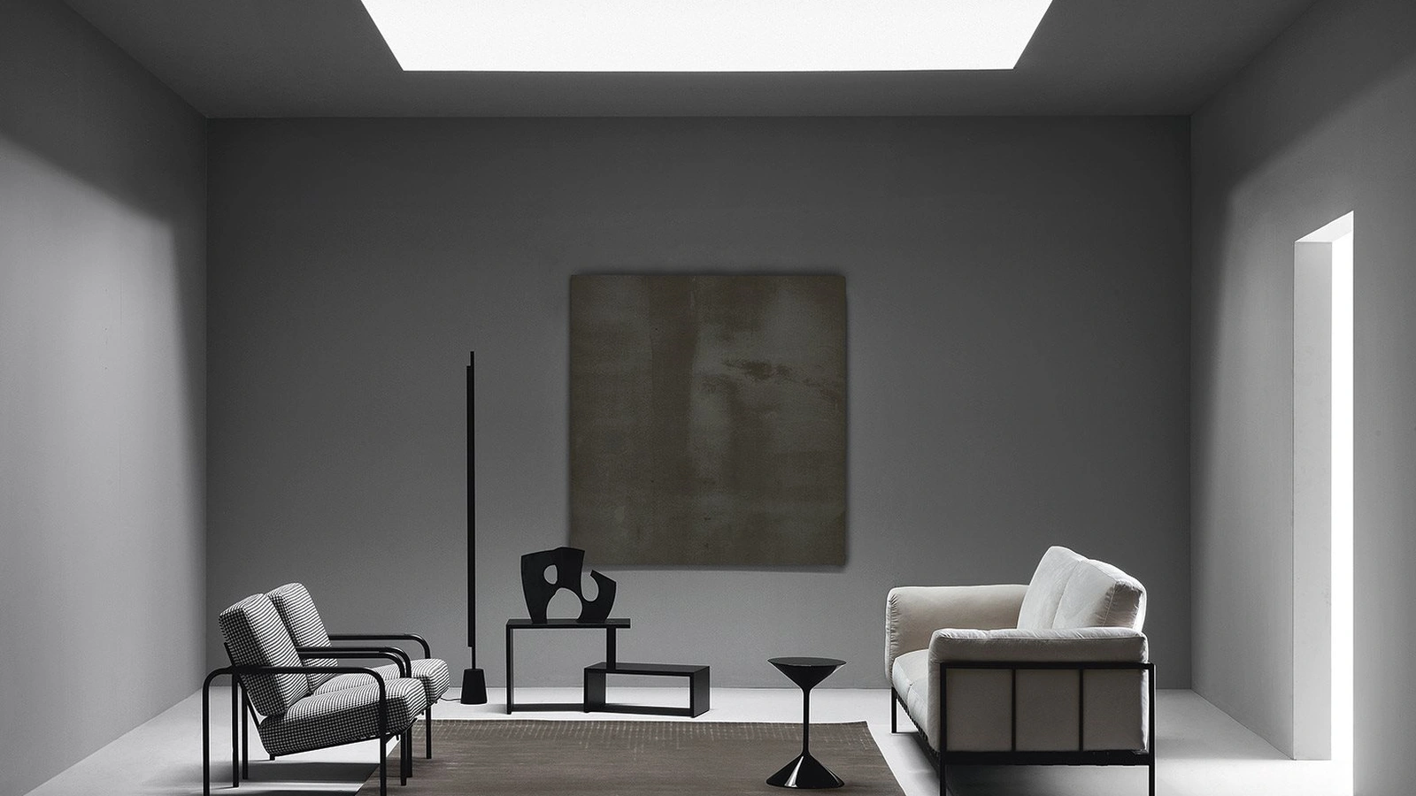 Linear fabric sofa with metal frame by Zanotta