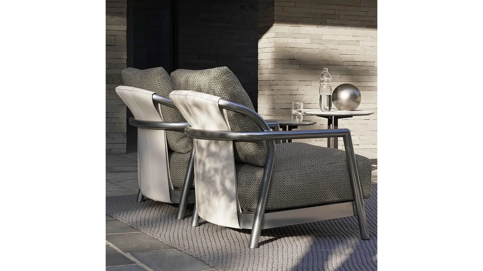 Alison Outdoor armchair in steel, rubber, and upholstered fabric by Flexform