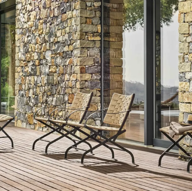 Carlotta Outdoor woven rope and steel armchair by Flexform