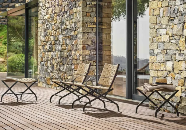 Carlotta Outdoor woven rope and steel armchair by Flexform