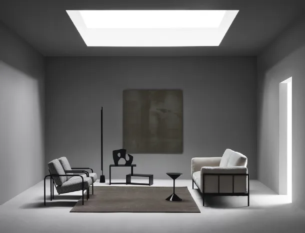 Linear fabric sofa with metal frame by Zanotta