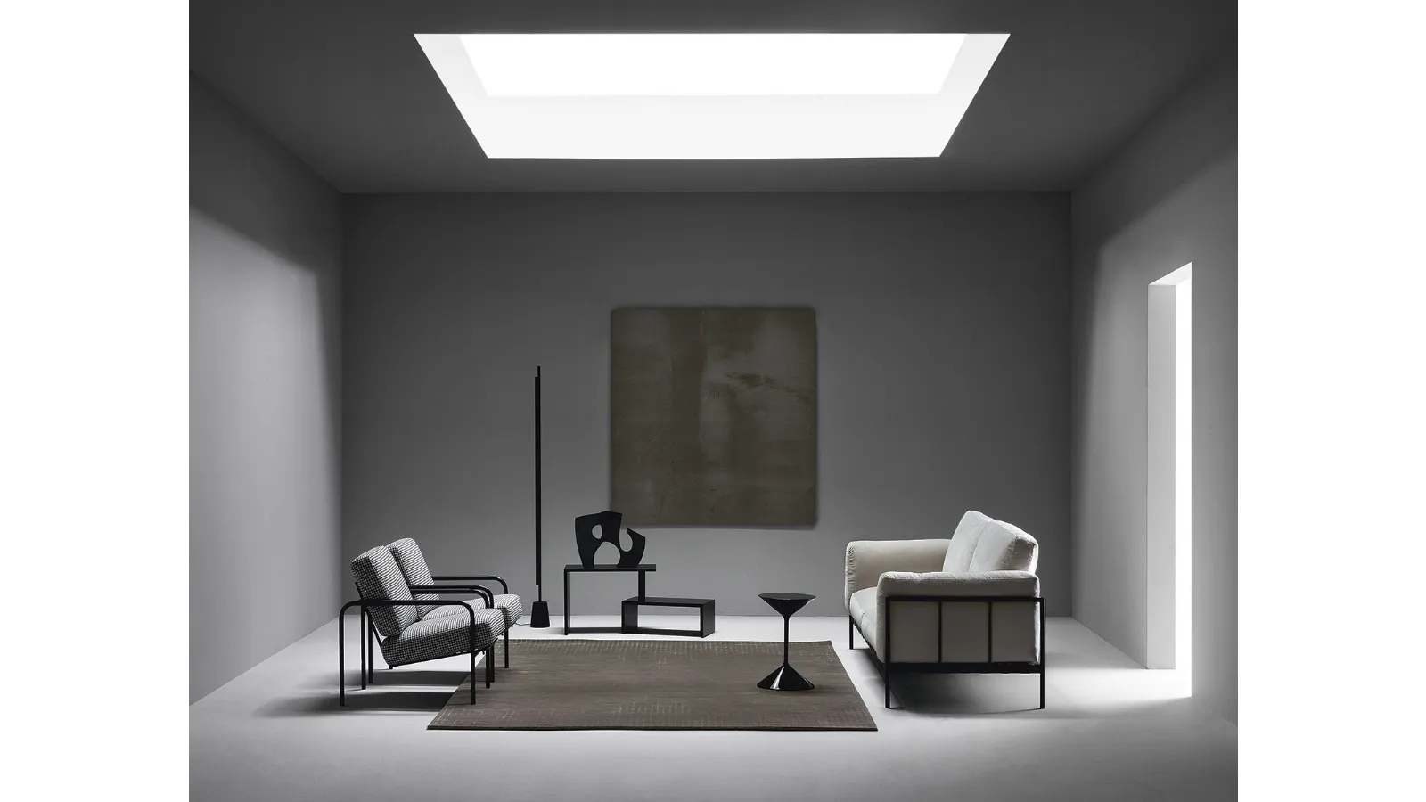 Linear fabric sofa with metal frame by Zanotta