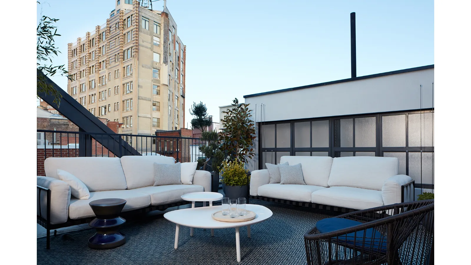 Linear sofa suitable for outdoor use, upholstered fabric with metal structure by Zanotta
